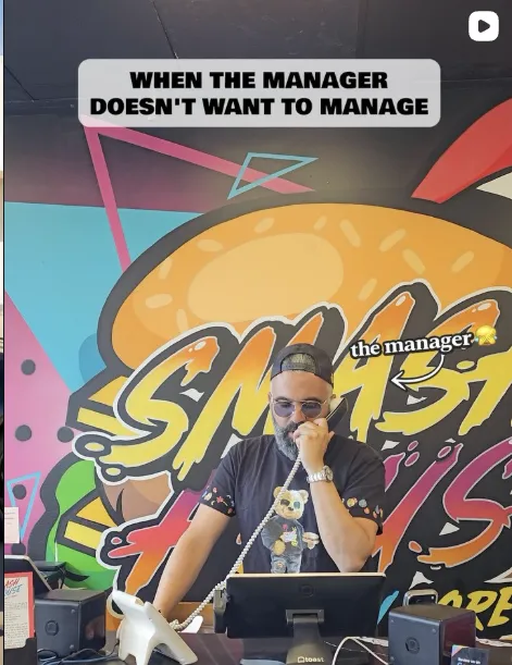 Man at desk with hand on chin; colorful background says "Smash" and "The Manager." Text above reads: "When the manager doesn't want to manage.